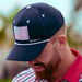 SwingJuice Men's Golf Flag Polo White & Flag Unisex Active Rope Hat Navy-Multi